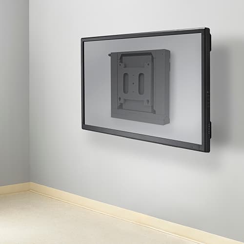 Rendered room scene showing the Chief XSD1U installed on a plain wall with a flat panel display fitted to the mount.