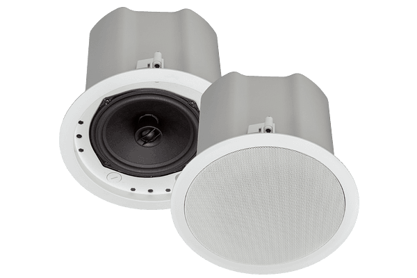 Two Crestron Saros Integrator ICI6T in-ceiling speakers, one with the white perforated grille fitted and one with the grille removed to show the woofer.