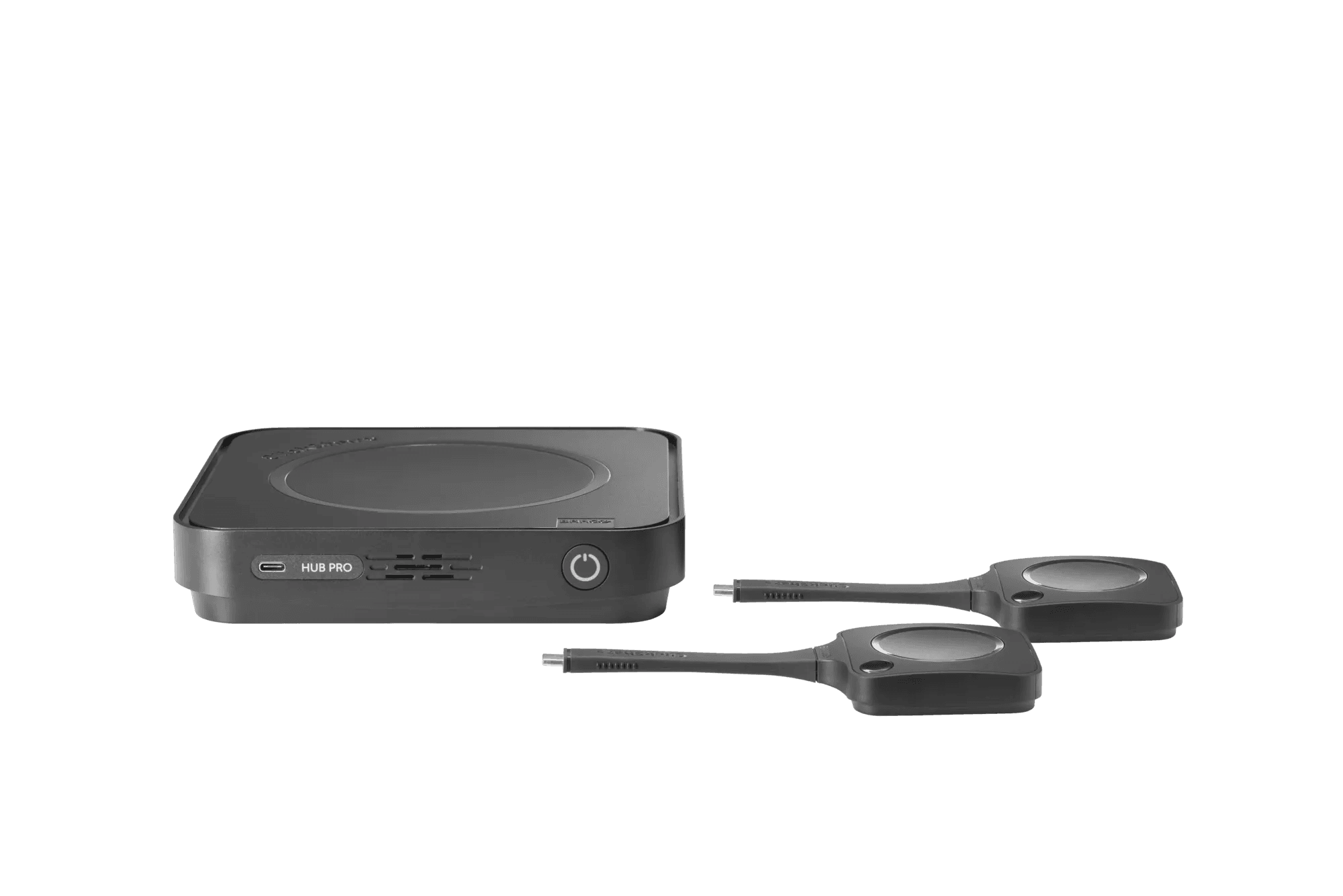 Barco ClickShare Hub Pro base unit shown front-left with two ClickShare Hub Buttons — the base unit part of this kit