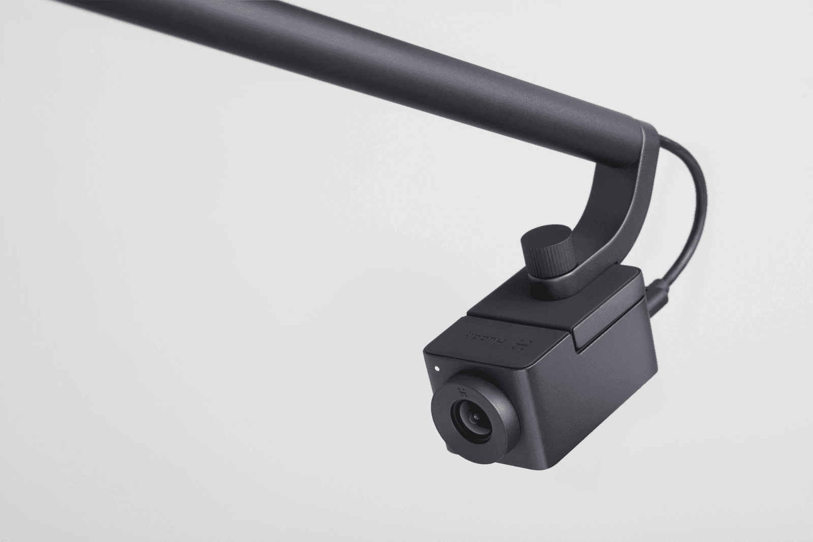 Huddly Canvas whiteboard camera on its extension arm mount