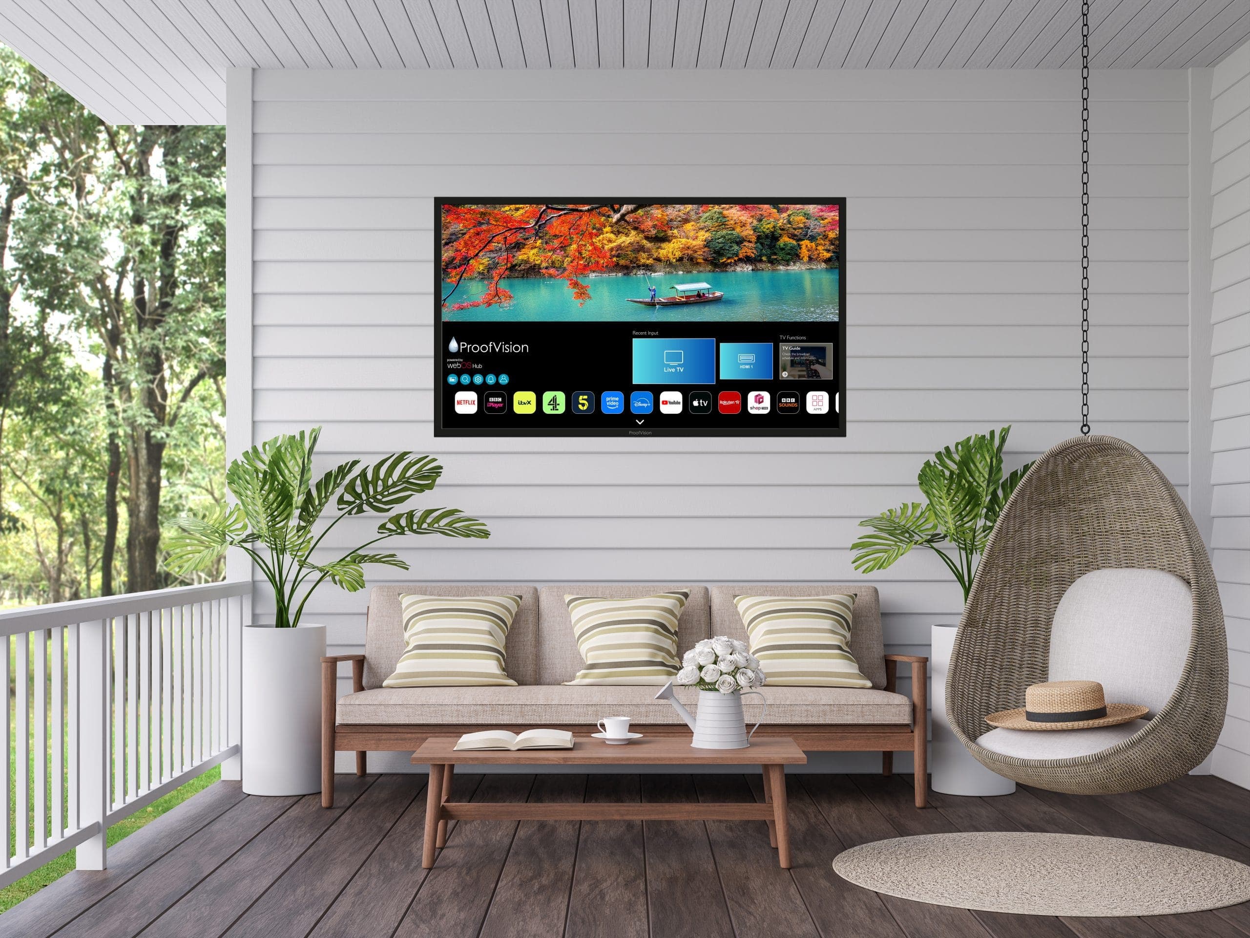 ProofVision Lifestyle Plus MX 55-inch outdoor TV installed outdoors — manufacturer lifestyle image