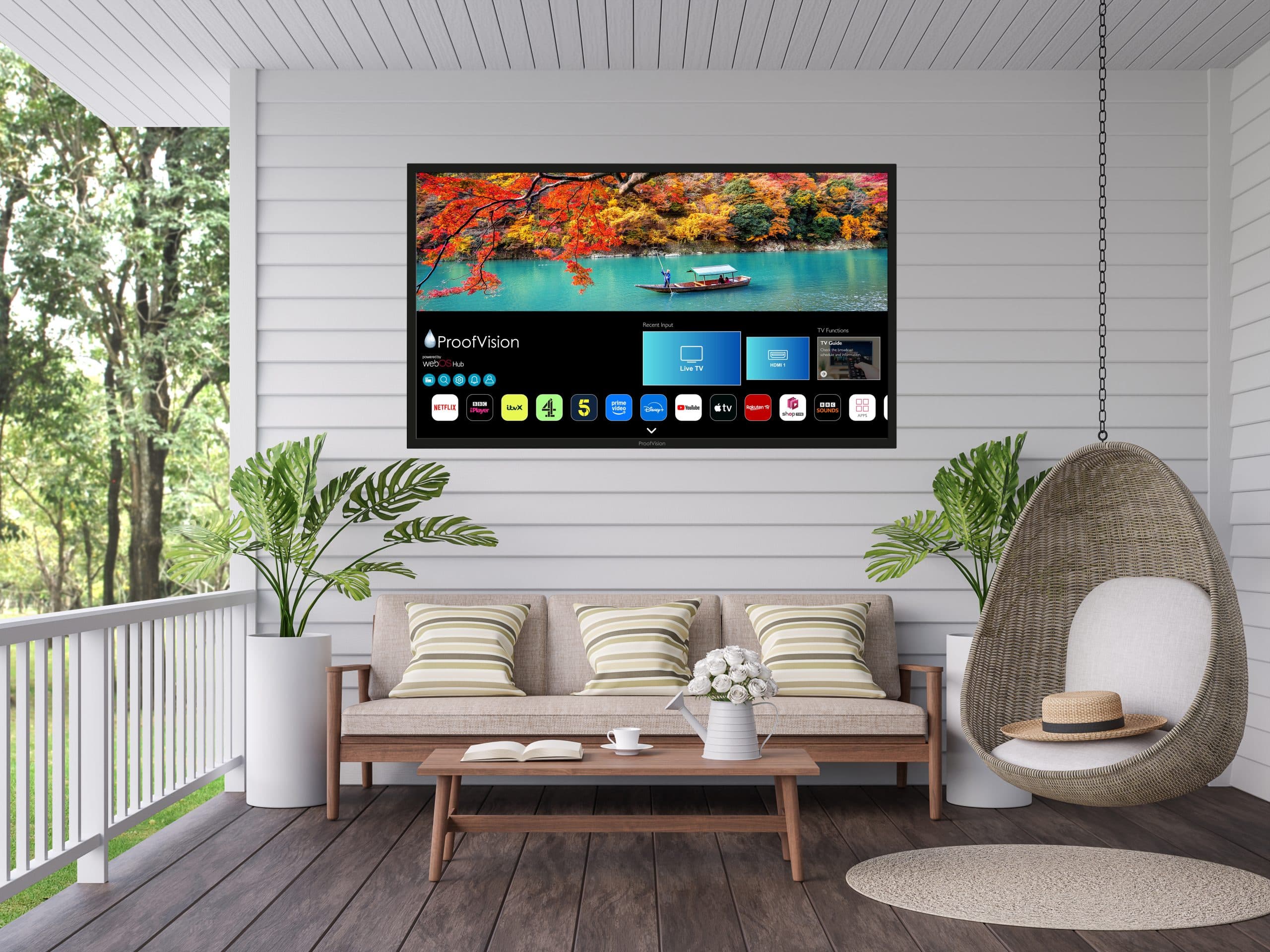 ProofVision Lifestyle Plus MX 65-inch outdoor TV installed outdoors — manufacturer lifestyle image