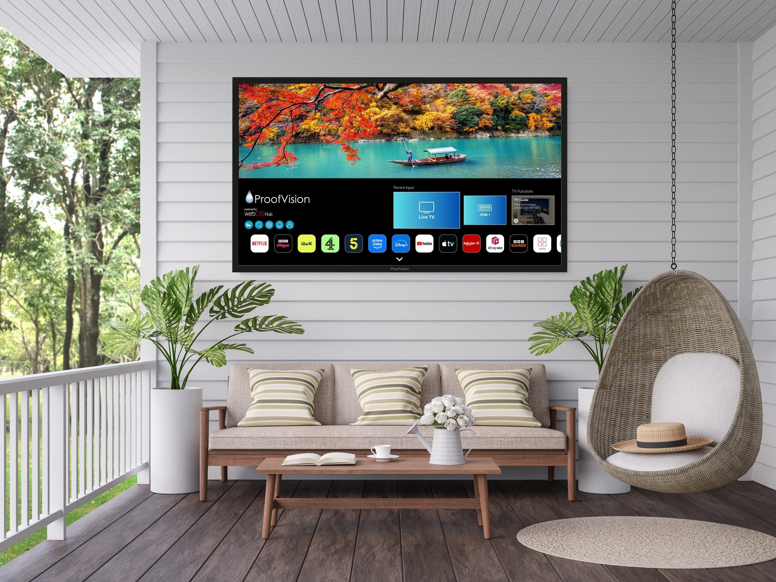 ProofVision Lifestyle Plus MX 75-inch outdoor TV installed outdoors — manufacturer lifestyle image
